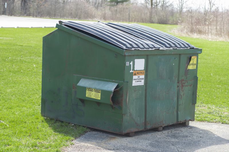 Commercial Dumpster in Parking Lot